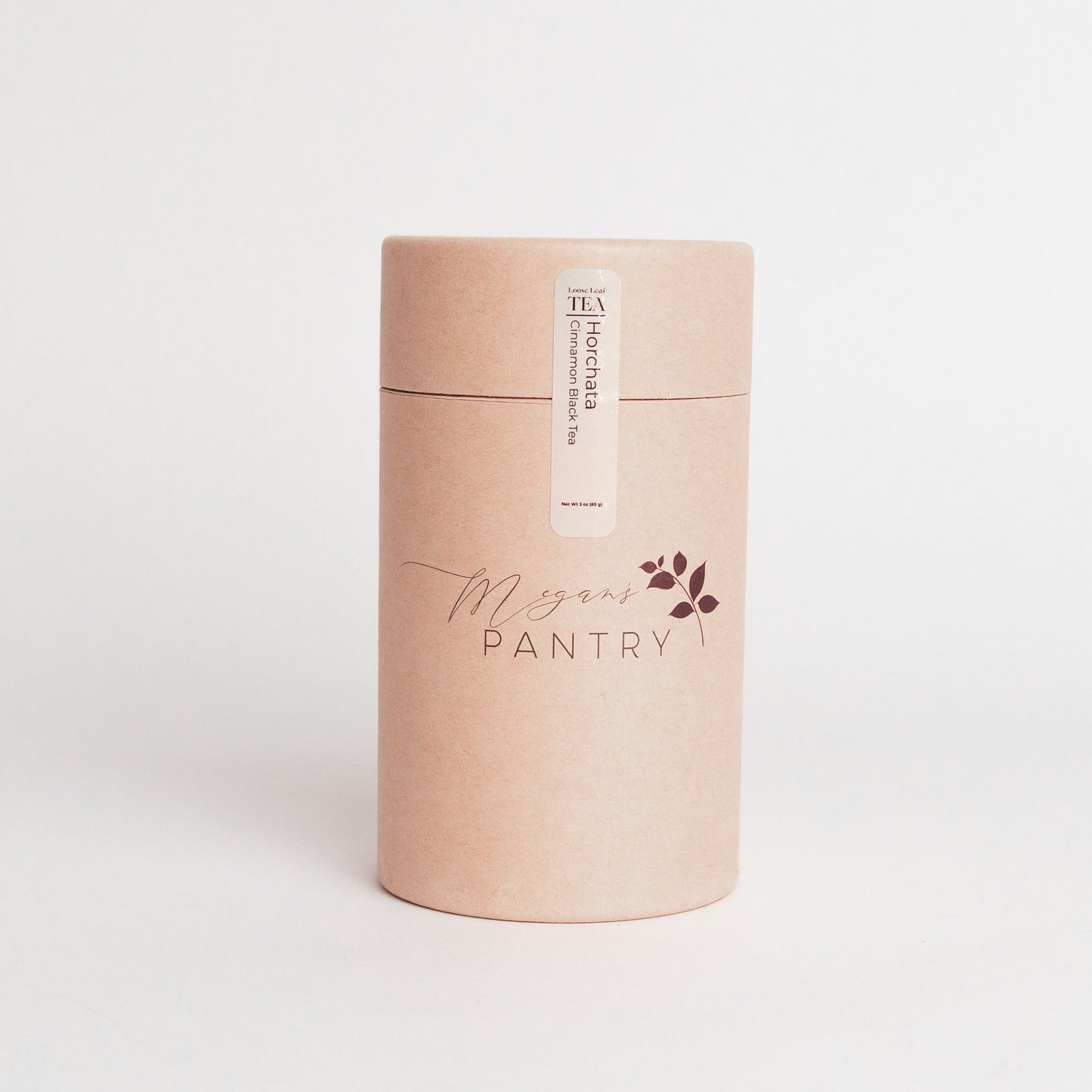 Kraft paper canister with 'Megan's Pantry' branding on a white background