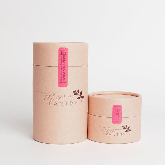 Two cardboard containers with pink labels on a white background