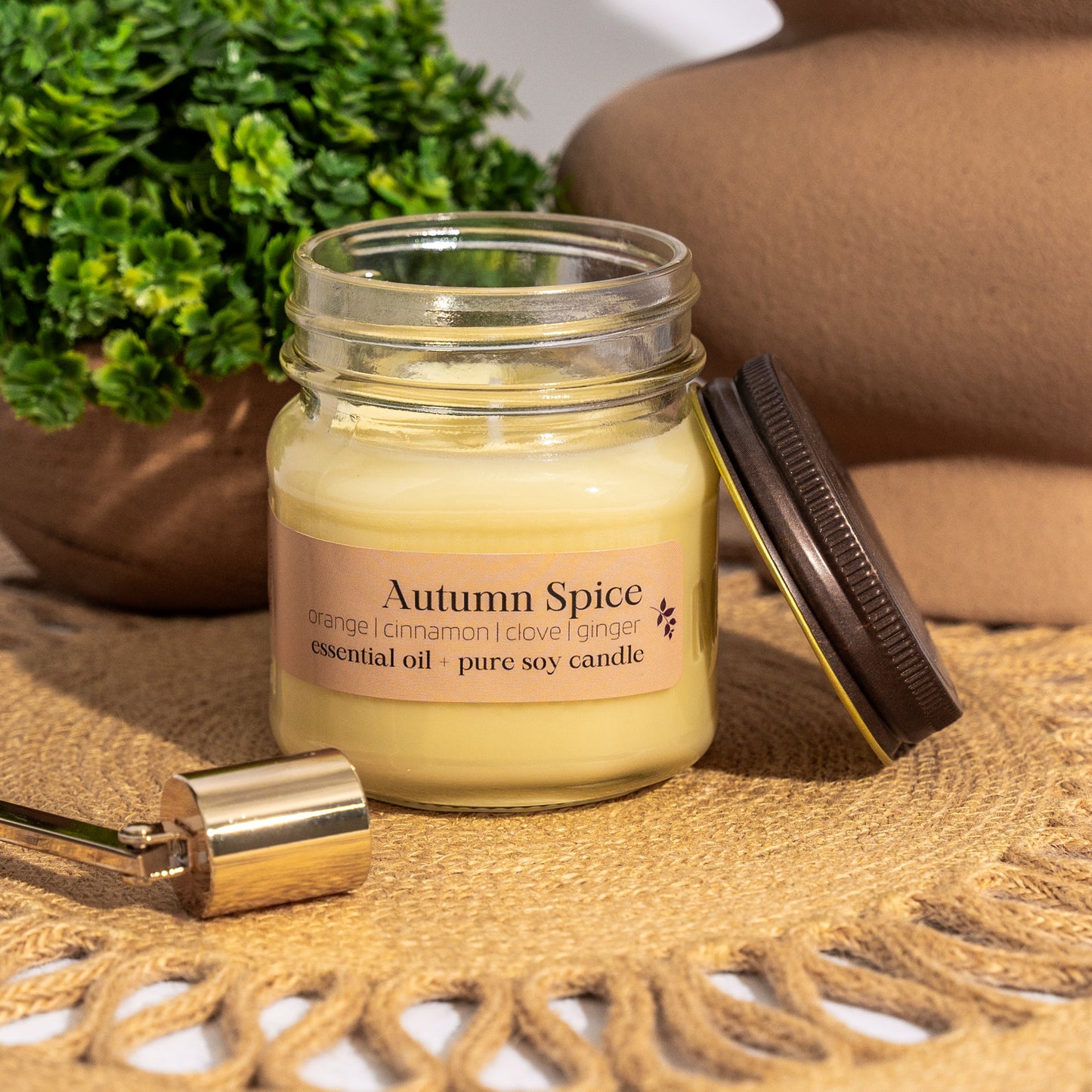 Autumn Spice is a blend of orange, cinnamon, clove and ginger essential oils, creating the perfect, warm Autumn aroma. Each 16-ounce candle is presented in a stunning glass jar with a bamboo lid, making it a timeless piece for your home or a thoughtful gift for anyone who cherishes moments of calm.